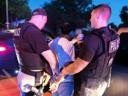 ICE ERO officers arrest an illegal alien. (FILE: ICE.gov)