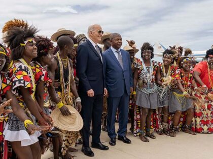 President Joe Biden and President Joao Lourenco of Angola pose for a photo with members of