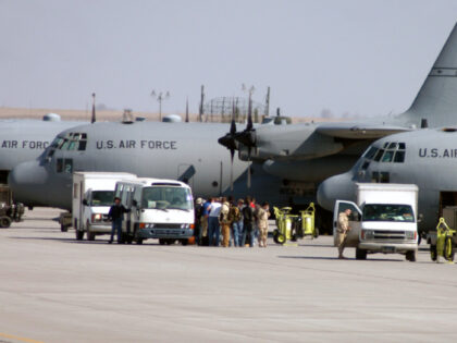 Air Force C-130 Hercules Loading Passengers (FILE: U.S. Air Force)