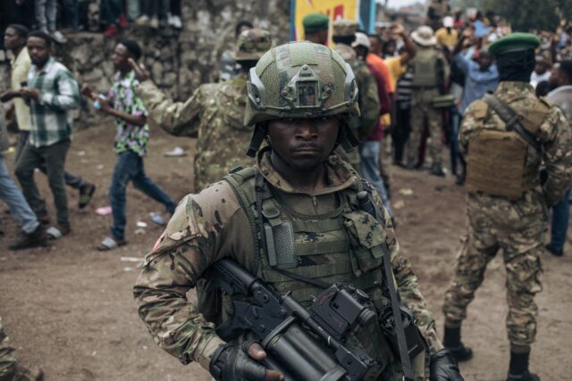 An M23 fighter at a stadium in Goma, the biggest city in eastern DRC, which the Rwanda-bac