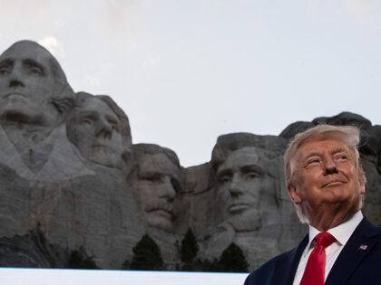 President Donald Trump smiles during a visit to Mount Rushmore National Memorial near Keys