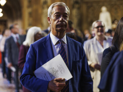 Reform MP Nigel Farage walks through the Central Lobby at the Palace of Westminster ahead