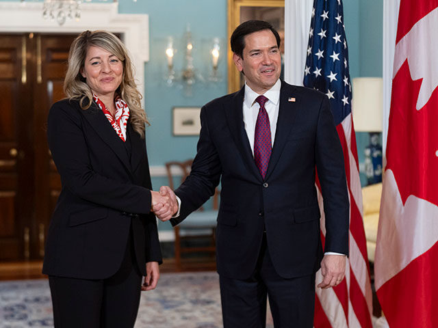 Secretary of State Marco Rubio greets Canada's Minister of Foreign Affairs Mélanie Joly i