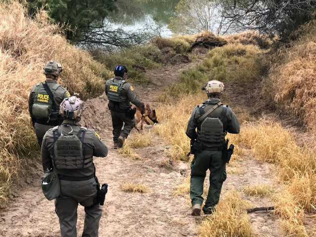 Border Patrol agents search for migrant smugglers who opened fire on their position. (U.S.