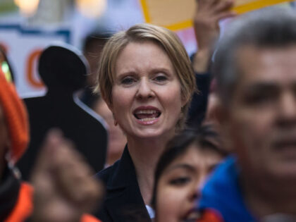 NEW YORK, NY - MAY 1: New York gubernatorial candidate Cynthia Nixon marches with activist