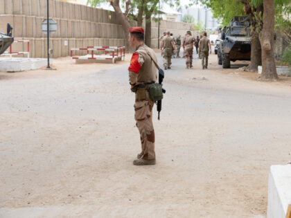 A French soldier guards the entrance to the Base Aerienne Projetee, also called air base 1