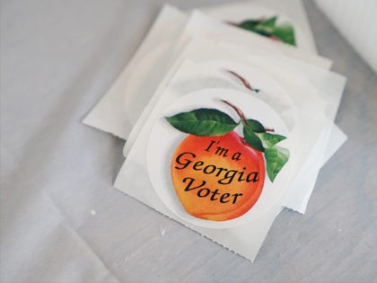 ATLANTA, GA - JUNE 09: A stack of "I'm a Georgia Voter" stickers are seen a