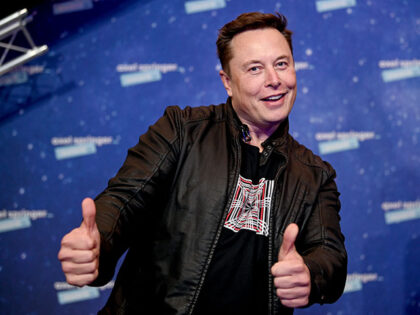 SpaceX owner and Tesla CEO Elon Musk arrives on the red carpet for the Axel Springer Award