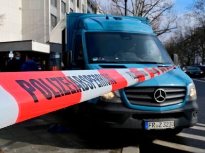 A cash-in-transit van is cordoned-off by the police after a robbery in the Kurfuerstendamm