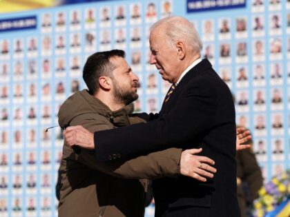 TOPSHOT - US President Joe Biden (R) is greeted by Ukrainian President Volodymyr Zelensky