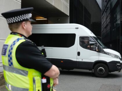 MANCHESTER, ENGLAND - AUGUST 18: A police van leaves Manchester Crown Court after nurse Lu