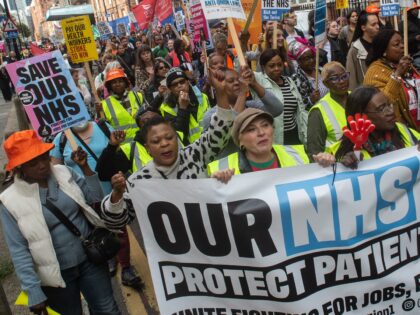 LONDON, ENGLAND - OCTOBER 4: Striking members of the BMA and UNIT trade unions march aroun