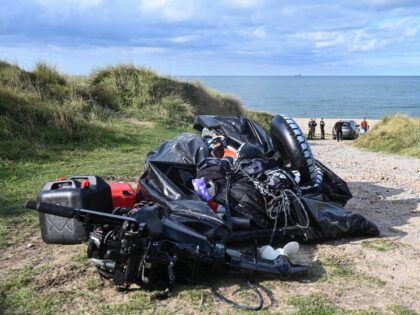 TOPSHOT - This photograph taken on September 15, 2024 shows a damaged migrants' boat after