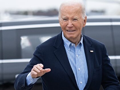 US President Joe Biden walks to board Air Force One prior to departure from Joint Base And