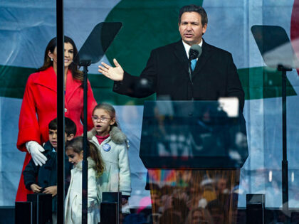 People attending the annual March for Life rally listen as Florida Governor Ron DeSantis (