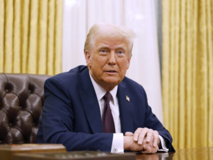 WASHINGTON, DC - JANUARY 23: U.S. President Donald Trump speaks to reporters after signing