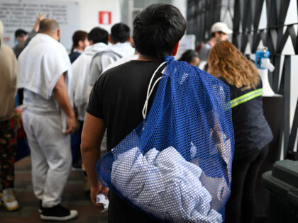 Guatemalan migrants deported from the United States are assisted at the Returnee Reception