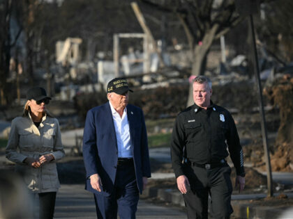 US President Donald Trump and First Lady Melania Trump tour a fire- affected area in the P