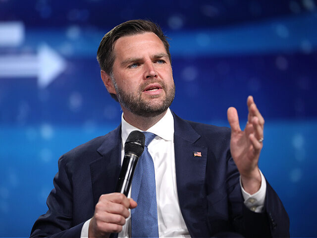 Republican vice presidential nominee and U.S. Senator J. D. Vance speaking with attendees