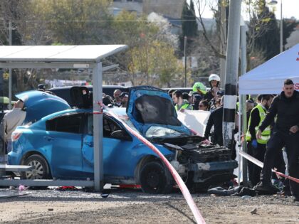 Israeli emergency responders gather at the site of a reported ramming attack in Jerusalem