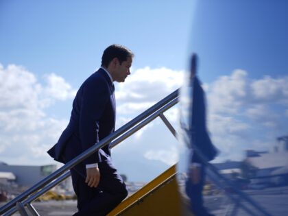 Secretary of State Marco Rubio boards a plane at La Aurora International Airport in Guatem