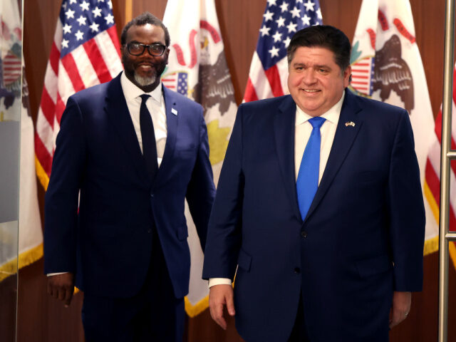 CHICAGO, ILLINOIS - APRIL 07: Chicago Mayor-Elect Brandon Johnson (L) and Illinois Governo