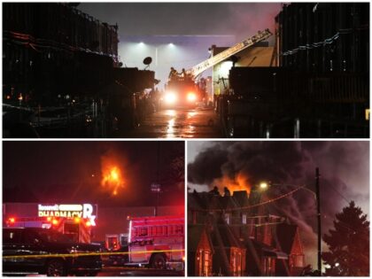 Philadelphia firefighters respond to the crash of a small jet. (AP PHOTOS)