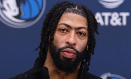 NBA star Anthony Davis talks t reporters in Dallas in the wake of his stunning trade to th