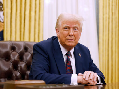 WASHINGTON, DC - JANUARY 23: U.S. President Donald Trump speaks to reporters after signing