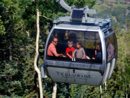 TELLURIDE, CO - JULY 8, 2014: The Colorado towns of Telluride and Mountain Village are lin