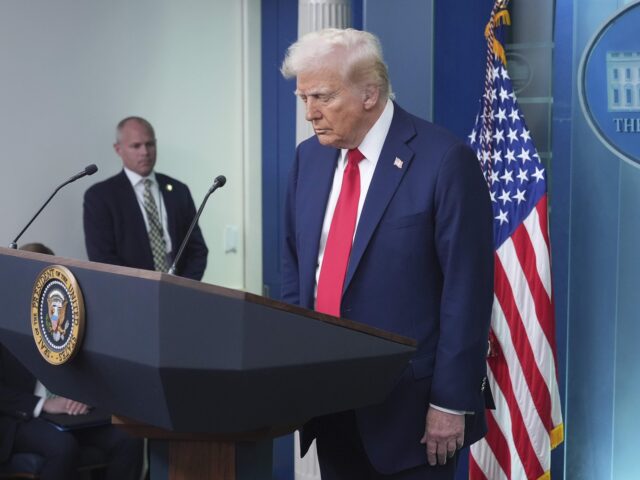 President Donald Trump asks for a moment of silence before he speaks in the James Brady Pr