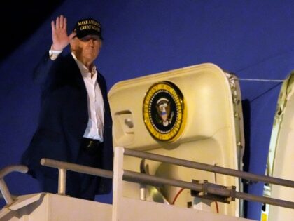 President Donald Trump boards Air Force One at Los Angeles International Airport in Los An