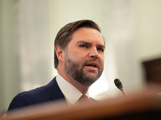 WASHINGTON, DC - JANUARY 29: U.S. Vice President JD Vance introduces Howard Lutnick, U.S.