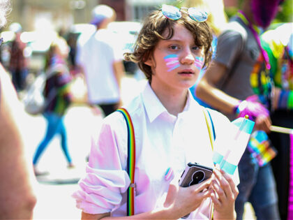 transgenderism youth with transgender flag