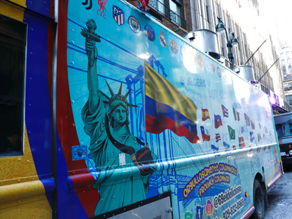 A Colombian food truck named "El Delicioso" stands in front of the Colombian Con