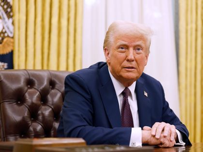 WASHINGTON, DC - JANUARY 23: U.S. President Donald Trump speaks to reporters after signing