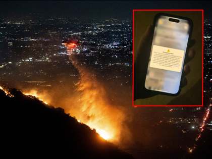 Water is dropped by helicopter on the burning Sunset Fire in the Hollywood Hills section o