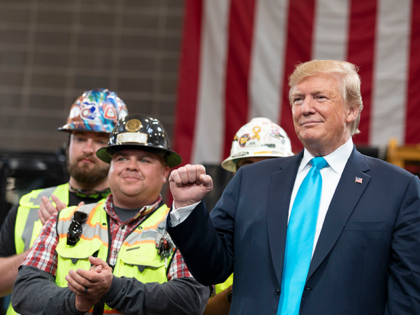 President Donald J. Trump acknowledges applause as he is welcomed to the International Uni